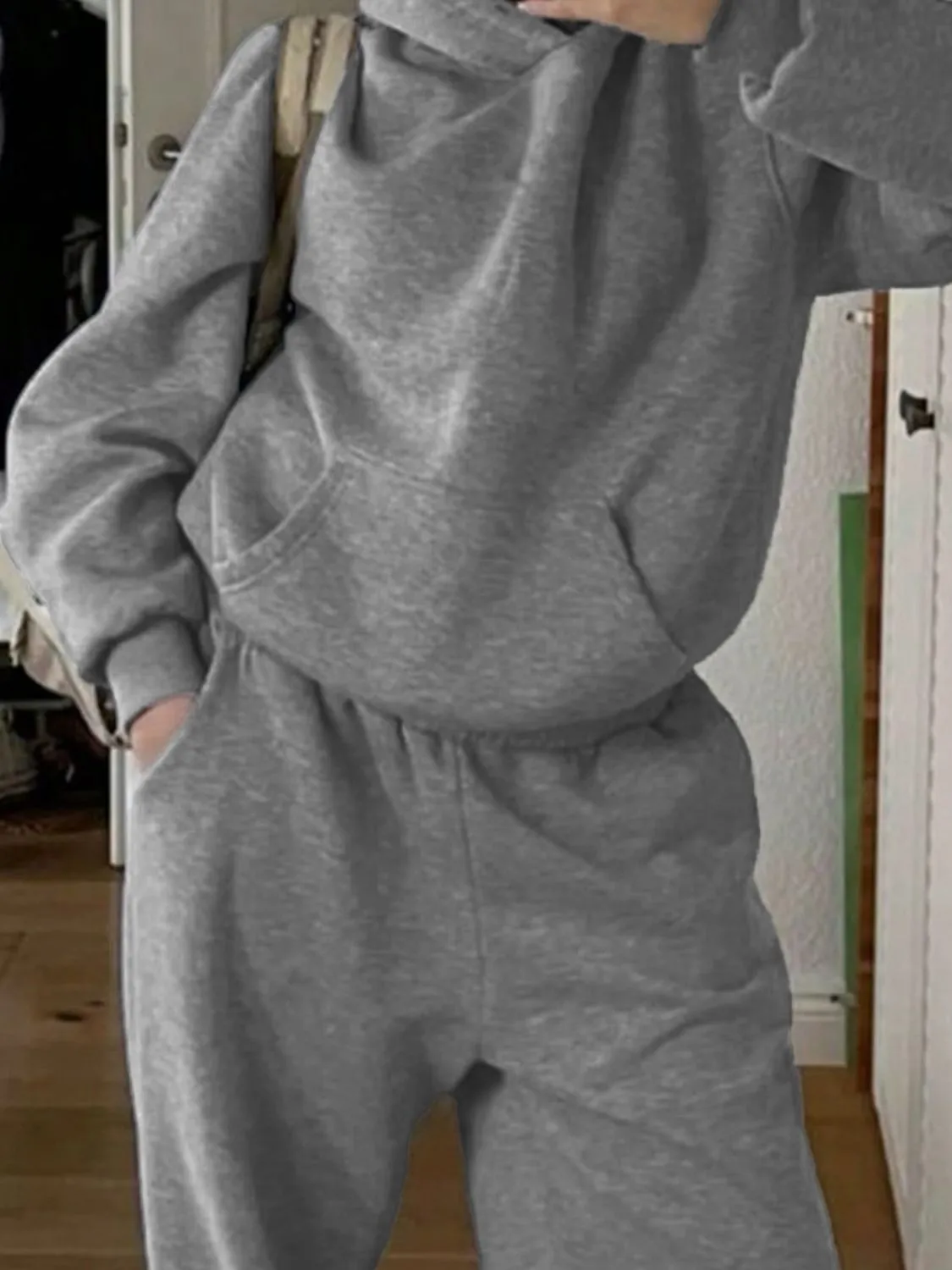 Hilda Long Sleeve Hooded Jumpsuit with Pockets